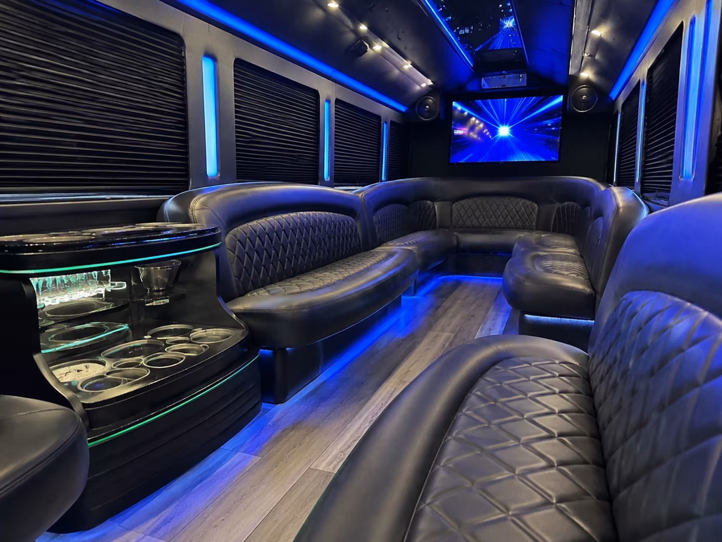 Group beside a Mercedes Sprinter limo in Overland Park