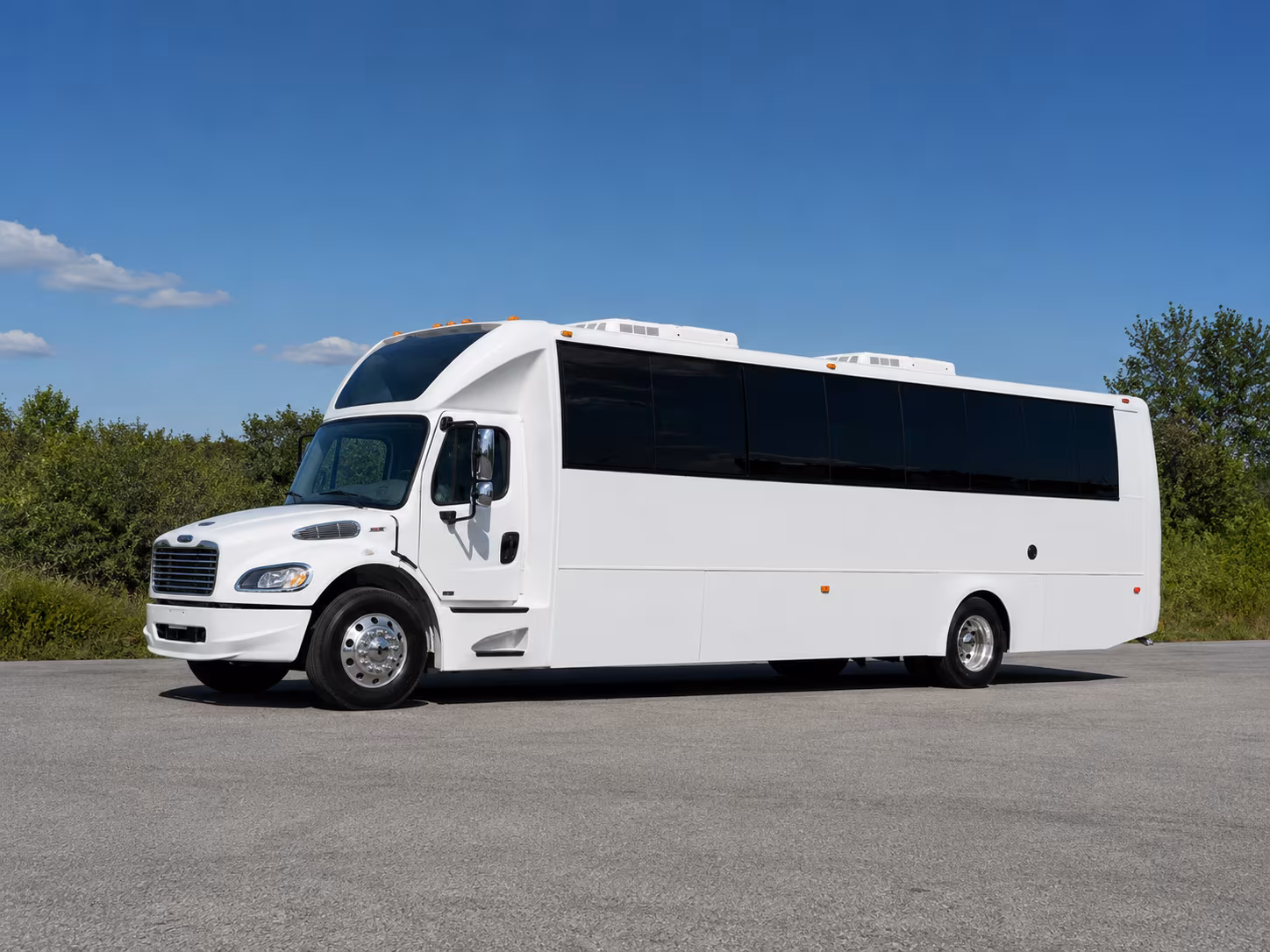Wedding guests seated inside a party bus serving Overland Park